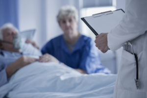 Doctor with elderly patients