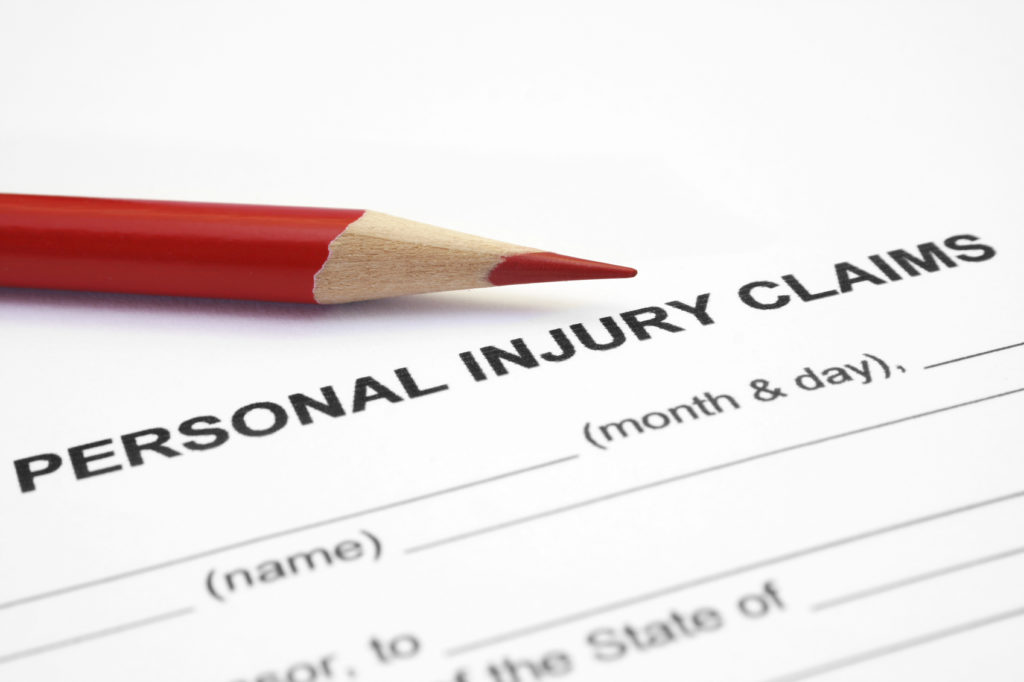 Personal Injury Claims Close up of pencil on Personal injury claim