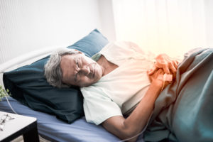 old man suffering from bedsores