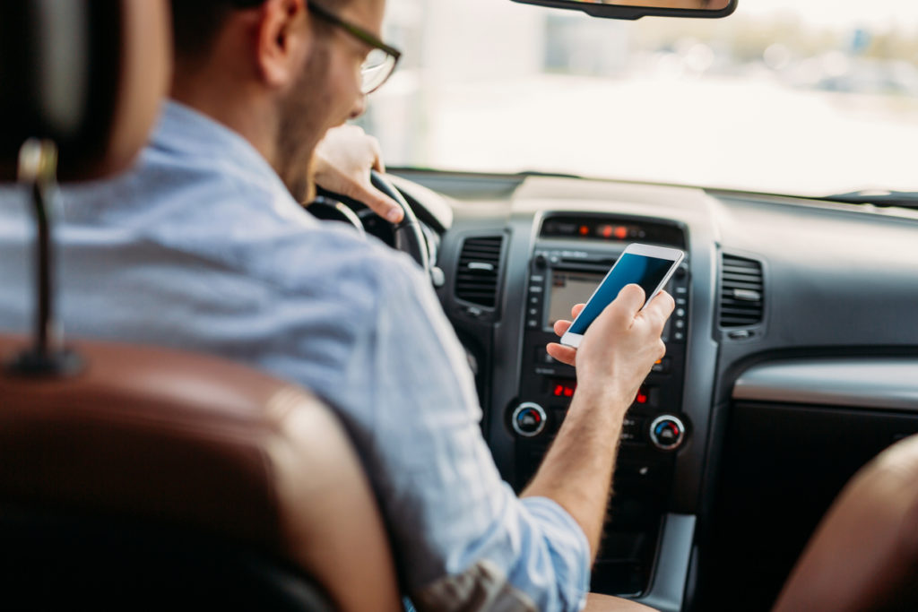 How Can Our Atlanta Car Accident Lawyers Help You After a Collision Caused By Distracted Driving?