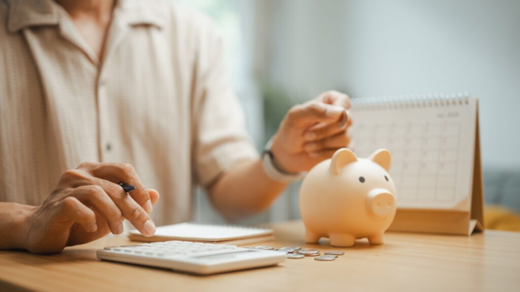 person calculating monthly benefits