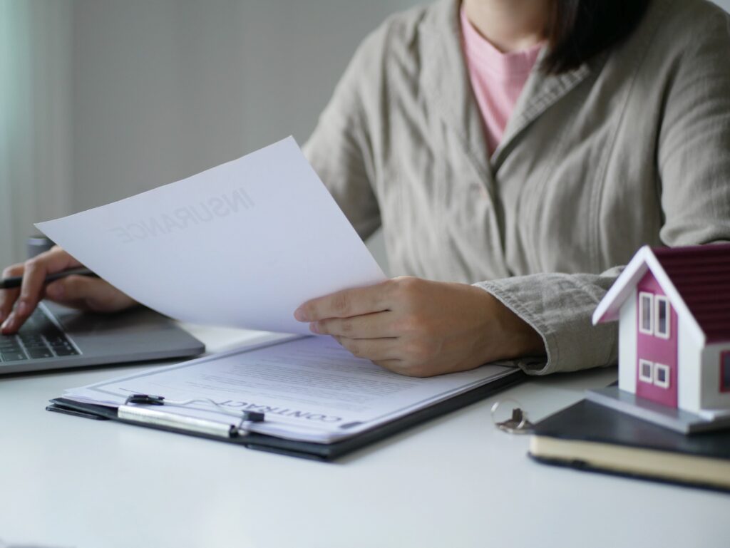 Insurance form paperwork with a pen