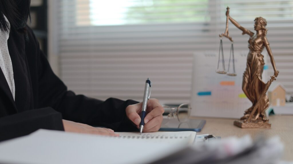 Calendar and legal documents used to track a claim deadline